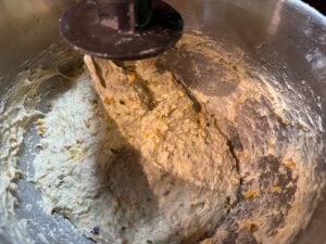 mixing dill pickle bread with pickle brine